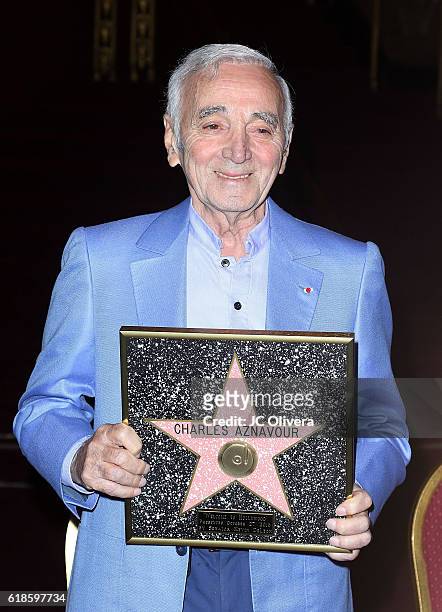 Charles Aznavour receives a Honorary Walk Of Fame Plaque by Senator Kevin De Leon at the Pantages Theatre on October 27, 2016 in Hollywood,...