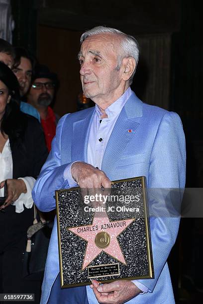 Charles Aznavour receives a Honorary Walk Of Fame Plaque by Senator Kevin De Leon at the Pantages Theatre on October 27, 2016 in Hollywood,...