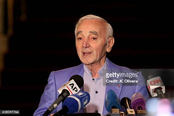 Charles Aznavour speaks during a ceremony where he was awarded a Honorary Walk Of Fame Plaque by Senator Kevin De Leon at the Pantages Theatre on...