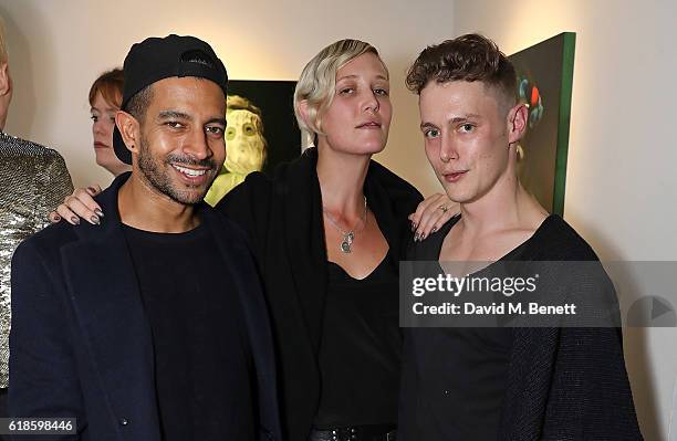 Nik Thakkar aka NEO 10Y, Fiona Garden and Ben Ashton attend the closing party of artist Ben Ashton's exhibition 'The King Is Dead, Long Live The...