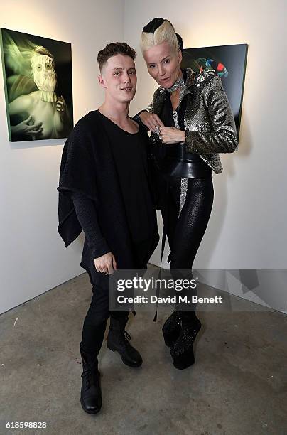 Ben Ashton and Daphne Guinness attend the closing party of artist Ben Ashton's exhibition 'The King Is Dead, Long Live The King' at The Cob Gallery...