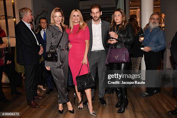 Gaia Trussardi, Michelle Hunziker, Tomaso Trussardi and Maria Luisa Trussardi attend Trussardi Lovy Bag Presentation on October 27, 2016 in Milan,...