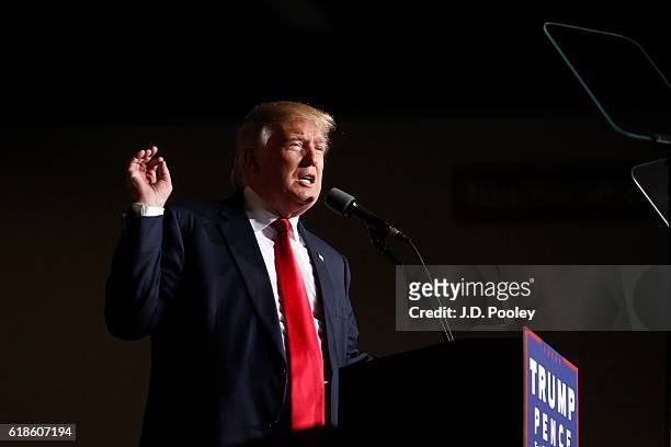 Republican presidential nominee Donald Trump speaks to supporters during a campaign event at the SeaGate Convention Centre on October 27, 2016 in...