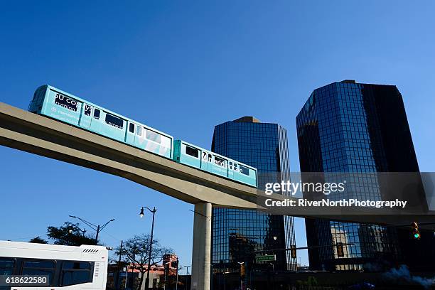 detroit renaissance center and people mover - detroit people mover stock pictures, royalty-free photos & images