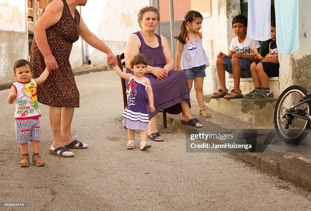 Child Stooping Sicily Street Life Grandmothers And Children Stoop Sitting High-Res ...