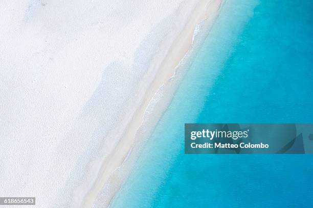 aerial view of deserted sandy beach. greece - meer strand im hintergrund stock-fotos und bilder
