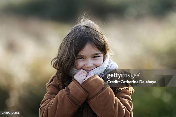 a 6 years old girl in the countryside - wool coat stock pictures, royalty-free photos & images