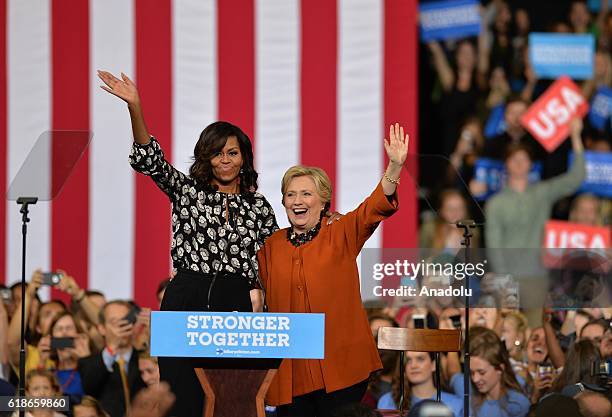 Democratic presidential candidate Hillary Clinton and US First Lady Michelle Obama are seen during a presidential campaign event in Winston-Salem,...