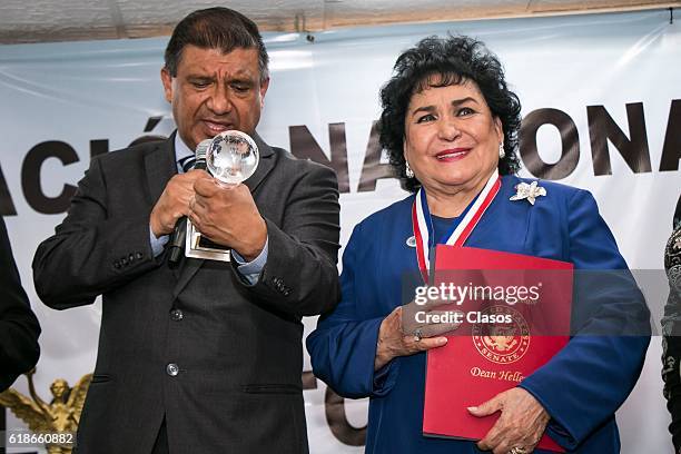 Mexican actress Carmen Salinas receives a medal during a ceremony to recognize her carrer of over 60 years at Asociacion Nacional de Locutores de...