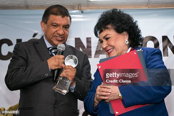 Mexican actress Carmen Salinas receives a medal during a ceremony to recognize her carrer of over 60 years at Asociacion Nacional de Locutores de...