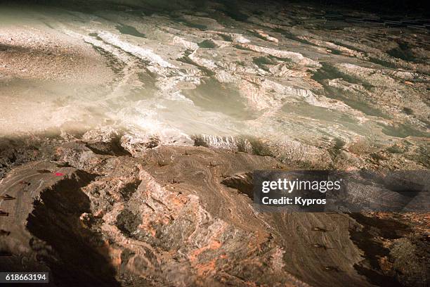 europe, germany, berchtesgaden, inside view of the salt mine (salt mountain / salzburg), within a mountain. shows water filled grotto, or lake with calcium crystals. - salz mineral stock pictures, royalty-free photos & images