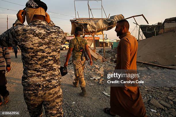 Iraqi soldiers now control the town of Qayyarah, where bombing destroyed many shops in town October 26, 2016. The residents of Qayyarah were...