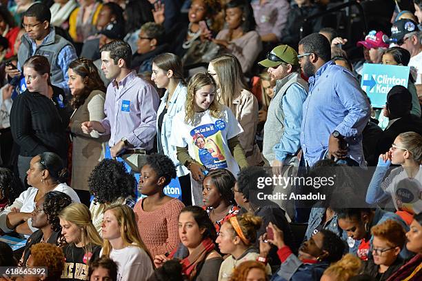 Supporters of Democratic presidential candidate Hillary Clinton attend the campaign rally in Winston-Salem, North Carolina, USA on October 27, 2016.