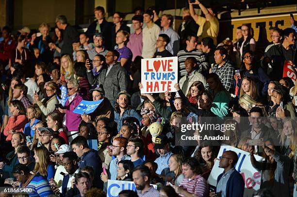 Supporters of Democratic presidential candidate Hillary Clinton attend the campaign rally in Winston-Salem, North Carolina, USA on October 27, 2016.
