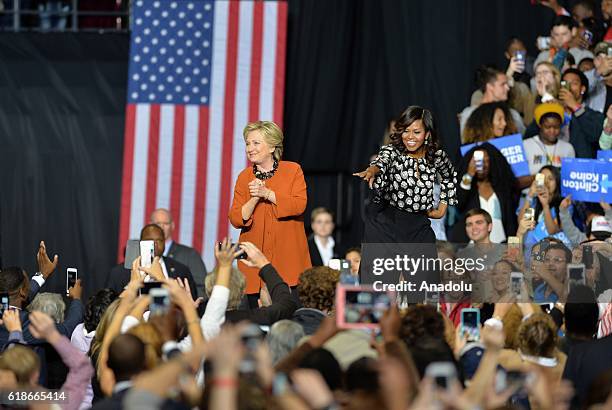 Democratic presidential candidate Hillary Clinton and US First Lady Michelle Obama are seen during a presidential campaign event in Winston-Salem,...