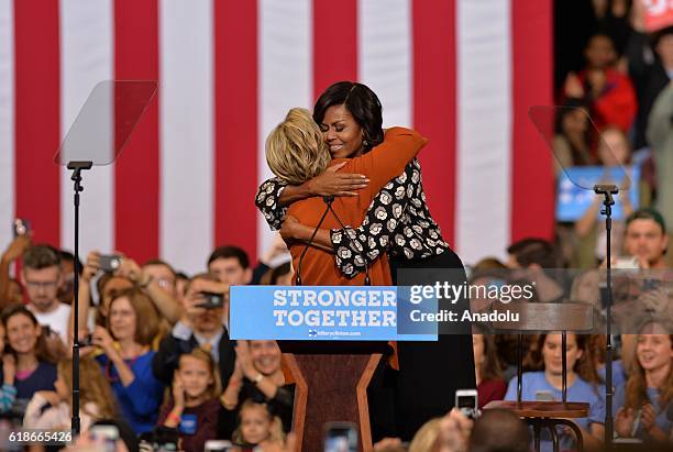 Democratic presidential candidate Hillary Clinton and US First Lady Michelle Obama are seen during a presidential campaign event in Winston-Salem,...