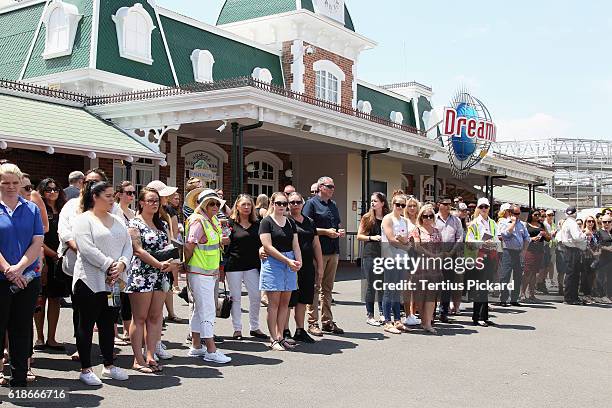 Staff members gather after a private memorial was held at Dreamworld on October 28, 2016 in Gold Coast, Australia. Four people were killed following...