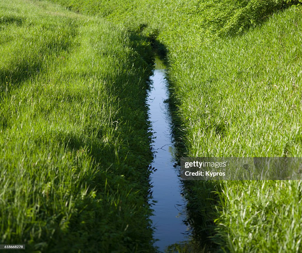 Europe, Germany, Bavaria, View Of Drainage Ditch Between Fields
