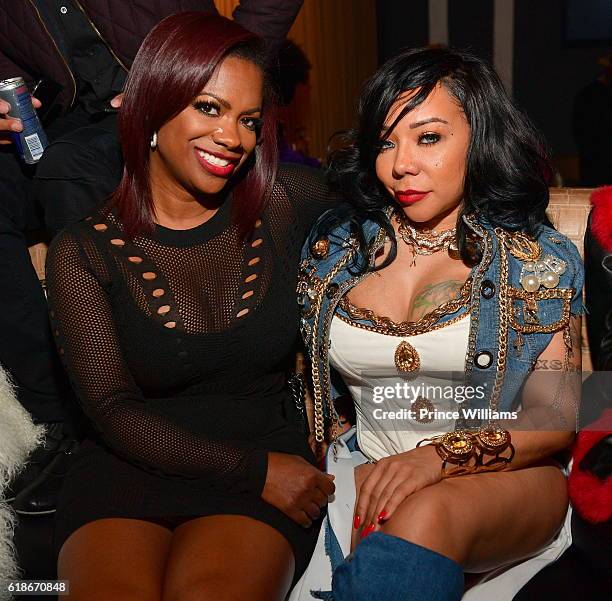 Kandi Burruss and Tameka 'Tiny' Harris attend Toya Wright's Players Ball Birthday Bash on October 27, 2016 in Atlanta, Georgia.