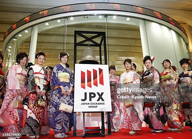 Japan - Young women wearing festive Japanese kimono attend the opening ceremony of the Tokyo Stock Exchange in the capital's Nihombashi Kabutocho...