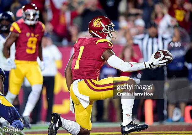 Wide receiver Darreus Rogers of the USC Trojans celebrates his touchdown to take a 7-0 lead over the California Golden Bears during the first quarter...