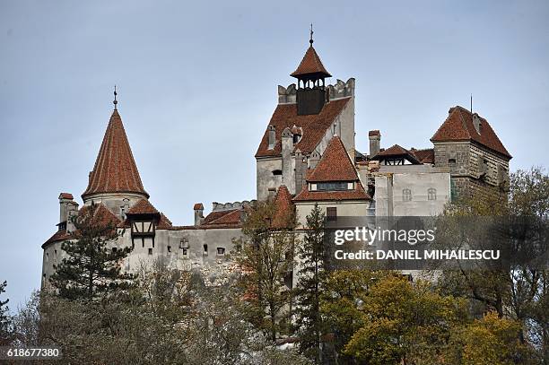 An exterior view of the Bran Castle is pictured in Bran, Romania on October 18, 2016. Armed with courage and hopefully garlic, two horror fans dying...