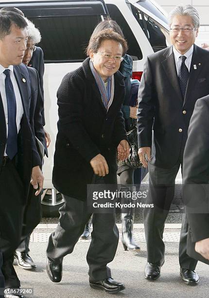 Japan - Tokyo Gov. Naoki Inose leaves Narita airport near the Japanese capital for London on Jan. 9 to attend a press conference as head of the Tokyo...