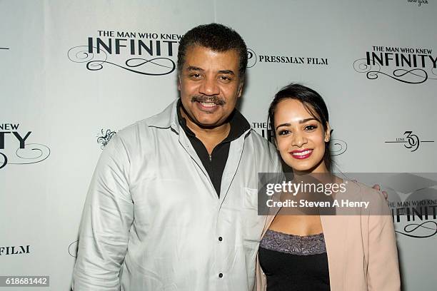 Actress Devika Bhise and physicist Neil deGrasse Tyson attend a dinner and conversation during "The Man Who Knew Infinity" New York Screening at...