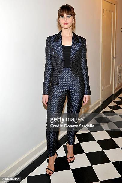 Actress Felicity Jones, wearing Burberry, attends the Vanity Fair and Burberry event celebrating Felicity Jones and the British Academy Britannia...