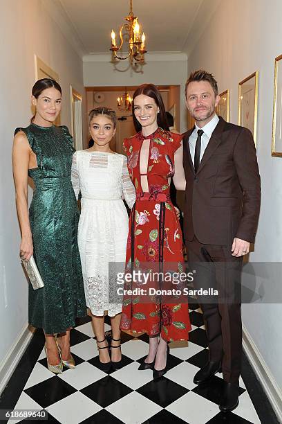 Actresses Michelle Monaghan, Sarah Hyland and Lydia Hearst, all wearing Burberry, and TV personality Chris Hardwick attend the Vanity Fair and...