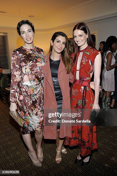 Comedian Whitney Cummings, actress Nasim Pedrad, and actress Lydia Hearst, in Burberry, attend the Vanity Fair and Burberry event celebrating...