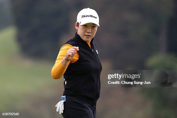 Jiyai Shin of South Korea reacts after a birdie putt on the 18th green during the first round of the Higuchi Hisako Ponta Ladies at the Musashigaoka...