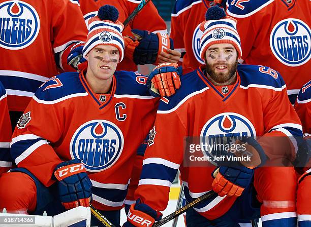 Connor McDavid and Eric Gryba of the Edmonton Oilers pose for a team picture after practice for the 2016 Tim Hortons NHL Heritage Classic to be...