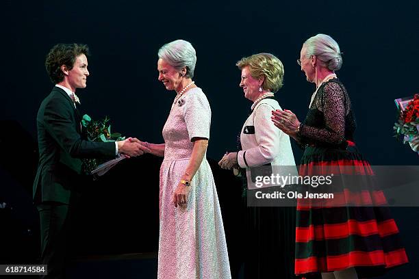 Danish Queen Margrethe and her sisters, Princess Bennedikte and Queen Anne-Marie of Greece gratulate young ballet dancer Andreas Kaas during after...