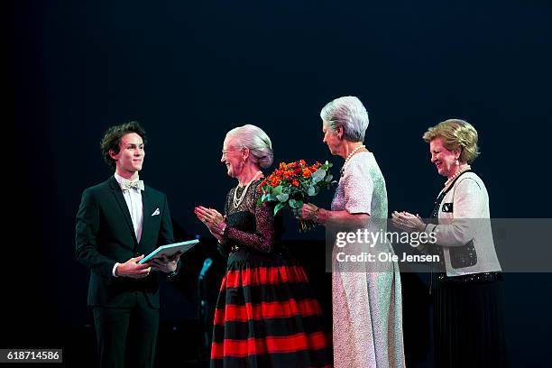 Danish Queen Margrethe and her sisters, Princess Bennedikte and Queen Anne-Marie of Greece gratulate young ballet dancer Andreas Kaas during after...