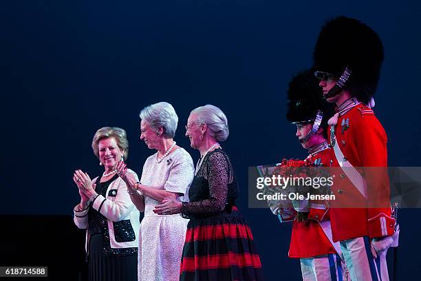 Danish Queen Margrethe ) and her sisters, Princess Bennedikte and Queen Anne-Marie of Greece during presentation of late Queen Ingriid's award to two...