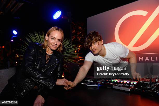 Actress Amber Valletta and DJ Chris Malinchak attend the unveiling of RH Las Vegas at The Gallery at Tivoli Village on October 27, 2016 in Las Vegas,...