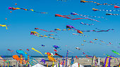 Colorful kites against a blue sky