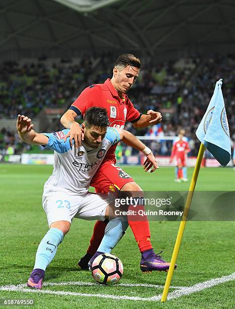 Bruno Fornaroli of the City and Sergio Guardiola of United compete for the ball during the round four A-League match between Melbourne City and...