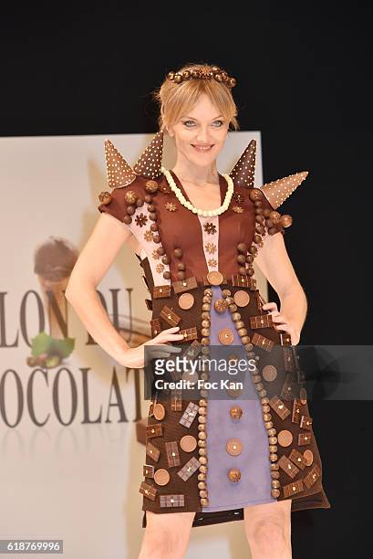 Maya Lauque dressed by Elise Chalmin and chocolated by Vincent Lechevallier walks the runway during the Chocolate fashion show as a part of the Salon...