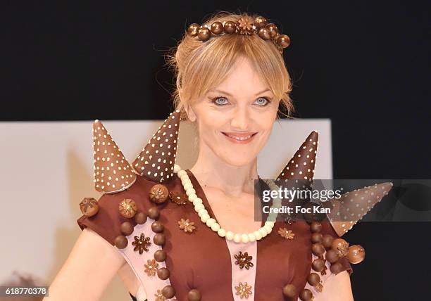 Maya Lauque dressed by Elise Chalmin and chocolated by Vincent Lechevallier walks the runway during the Chocolate fashion show as a part of the Salon...