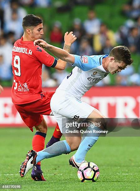Sergio Guardiola of United and Connor Chapman of the City compete for the ball during the round four A-League match between Melbourne City and...