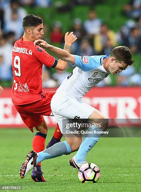 Sergio Guardiola of United and Connor Chapman of the City compete for the ball during the round four A-League match between Melbourne City and...