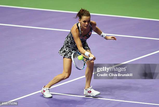 Agnieszka Radwanska of Poland volleys in her singles match against Karolina Pliskova of Czech Republic during day 6 of the BNP Paribas WTA Finals...