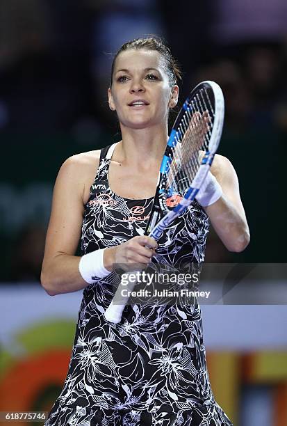 Agnieszka Radwanska of Poland celebrates victory in her singles match against Karolina Pliskova of Czech Republic during day 6 of the BNP Paribas WTA...