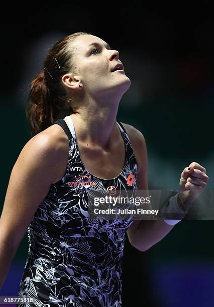 Agnieszka Radwanska of Poland celebrates victory in her singles match against Karolina Pliskova of Czech Republic during day 6 of the BNP Paribas WTA...