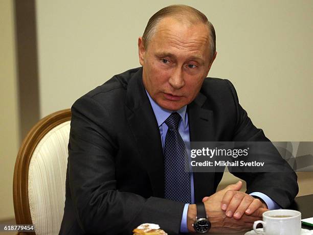 Russian President Vladimir Putin speaks during his meeting with farmers of the Krasnodar Krai region at the Bocharov Ruchey state residence on...