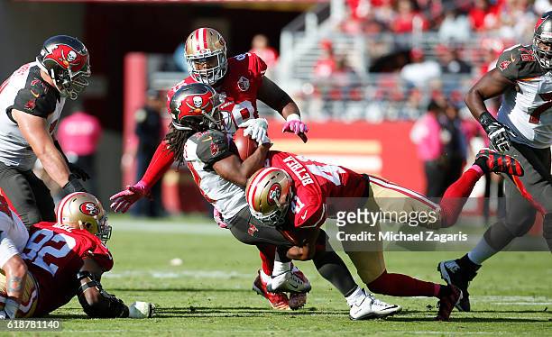 Antoine Bethea of the San Francisco 49ers tackles Jacquizz Rodgers of the Tampa Bay Buccaneers during the game at Levi Stadium on October 23, 2016 in...