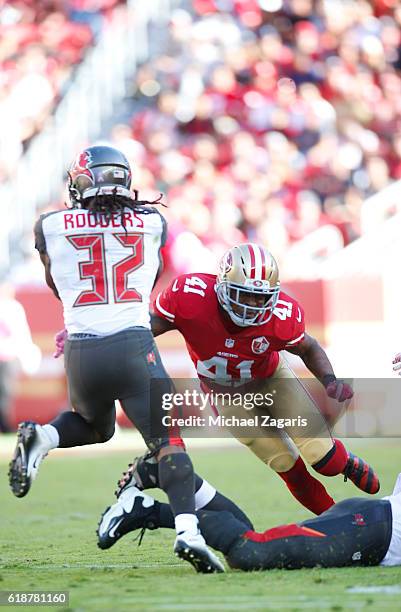 Antoine Bethea of the San Francisco tackles Jacquizz Rodgers of the Tampa Bay Buccaneers during the game at Levi Stadium on October 23, 2016 in Santa...