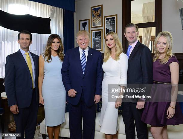 Walt Disney Television via Getty Images NEWS - The Trump family gathers for a photo at the opening of the Trump International Hotel in Washington DC,...